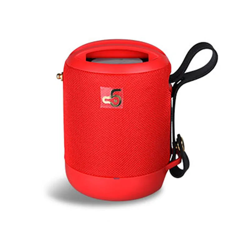 Small black portable Bluetooth speaker with carrying handle, showing FM radio and card slot features.