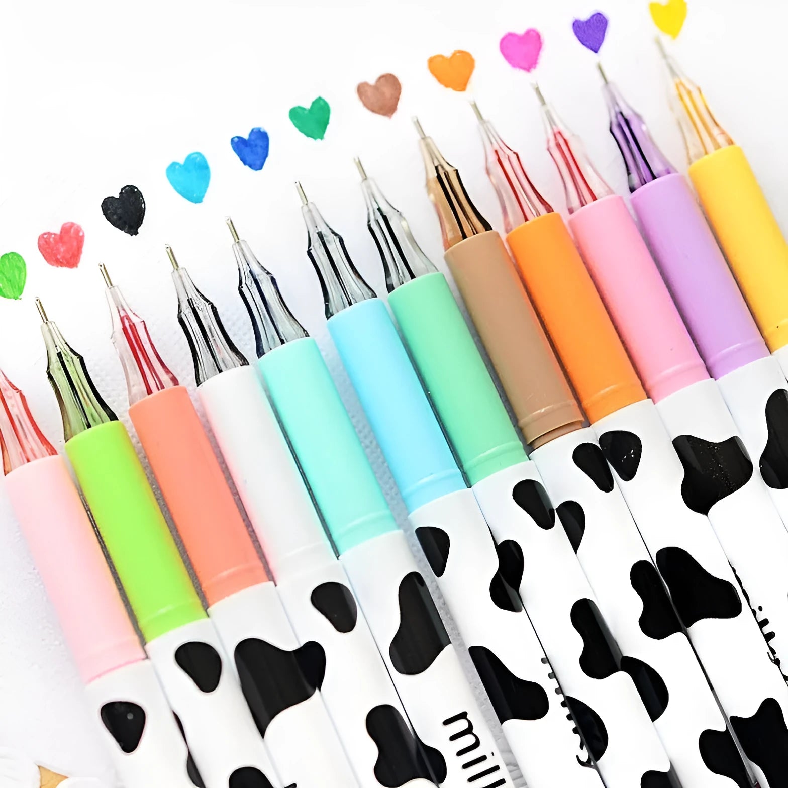 Box of 12 cow print gel pens with a 0.38mm fine tip in assorted colours.