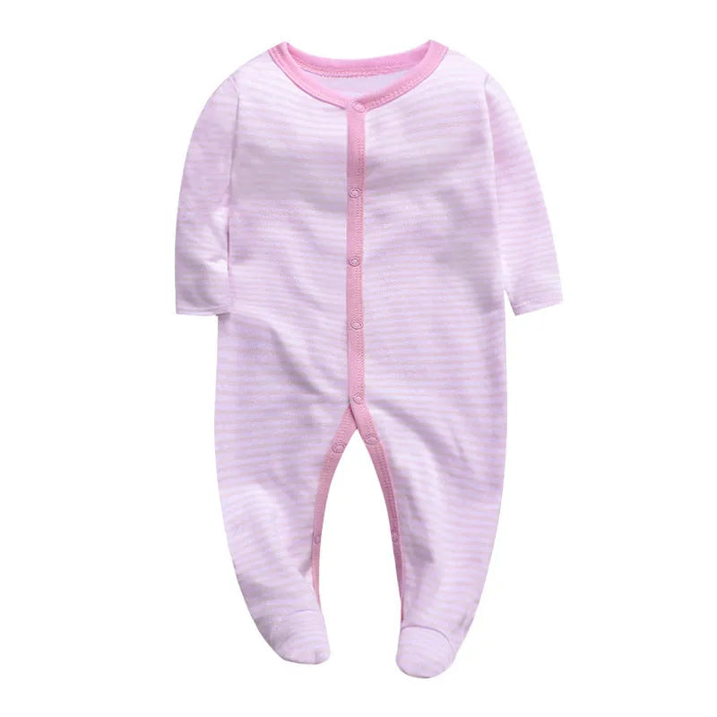 A soft cotton baby one-piece garment featuring a dinosaur print, shown on a hanger.