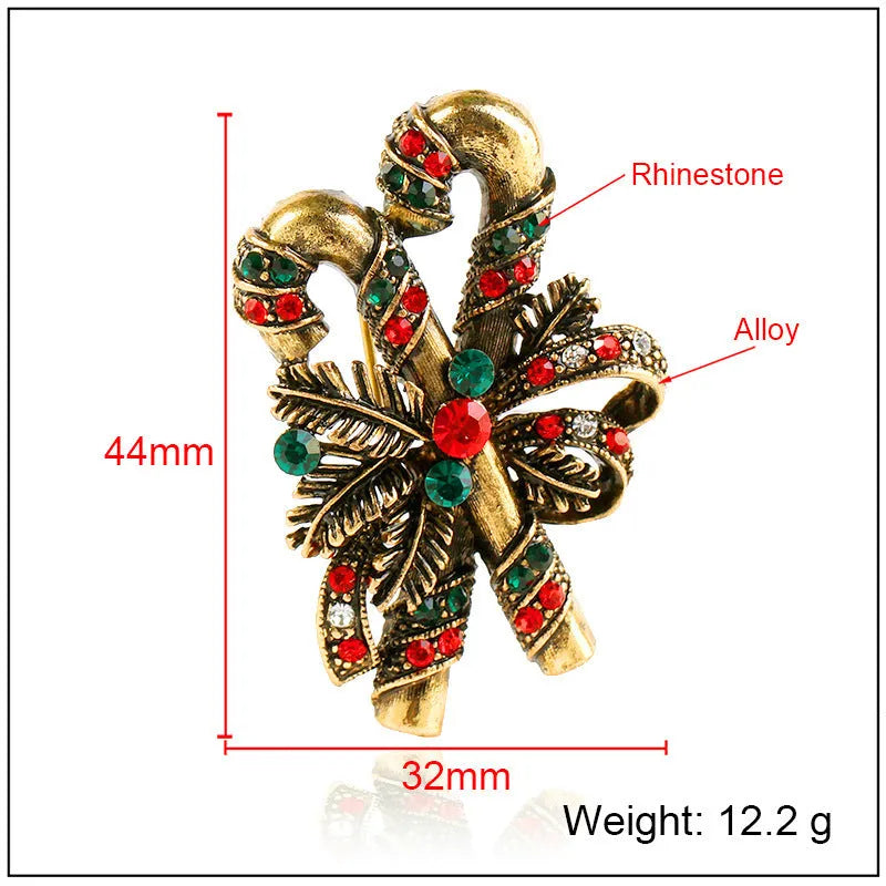 Christmas suit pin brooch in ancient gold alloy with artificial gem inlay, bell style