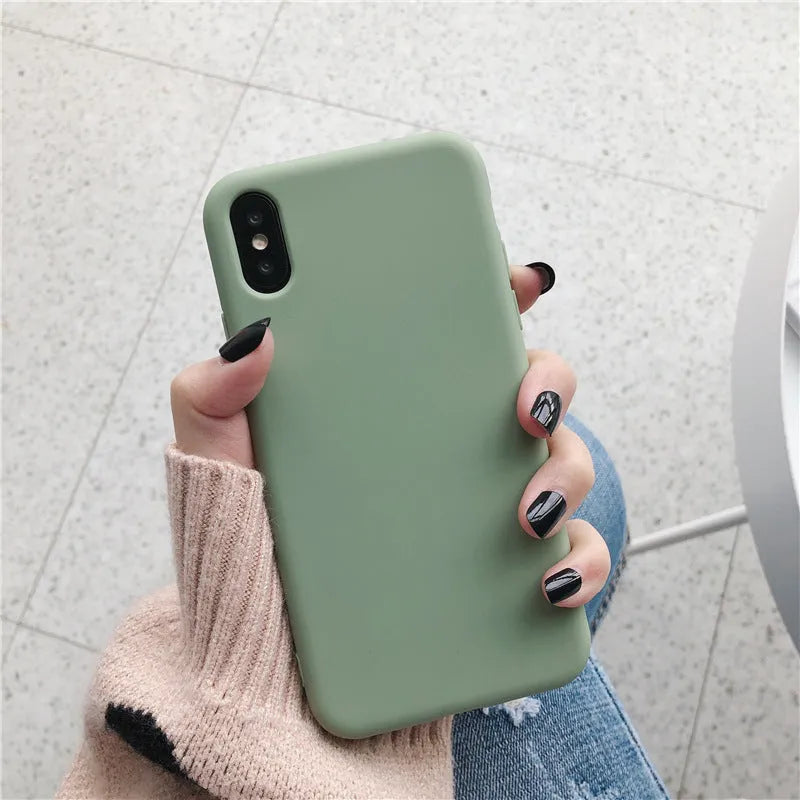 Silicone phone case for iPhone shown in multiple colours including wine red, light blue, and black.