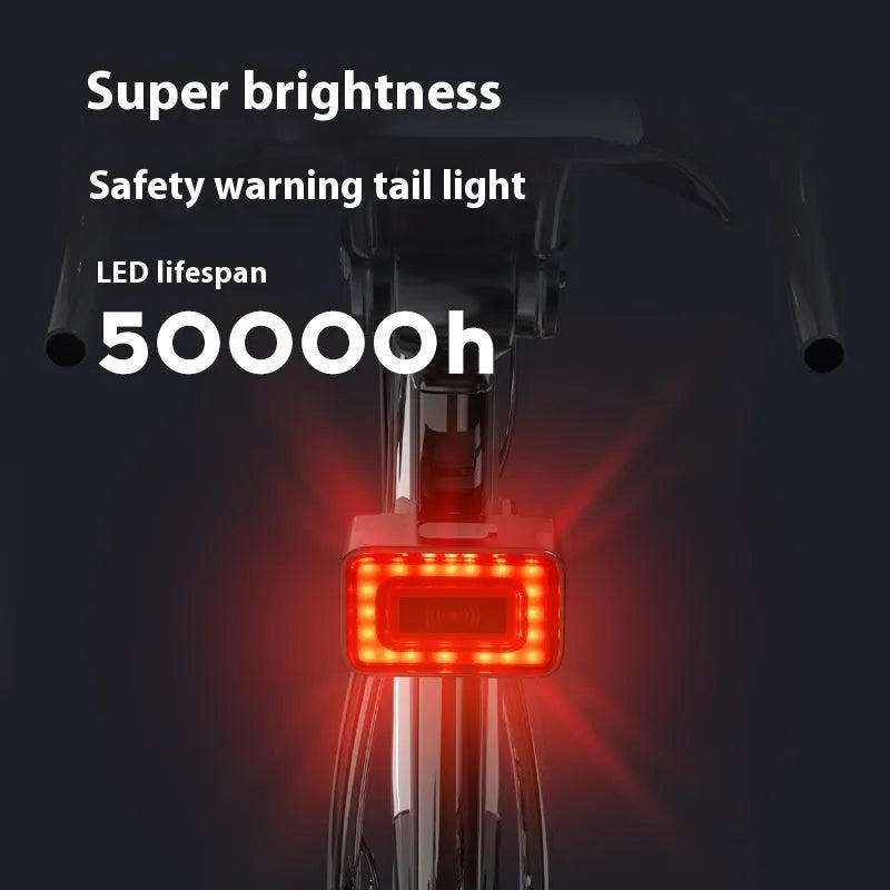 Compact black radar bicycle taillight with dual mount bracket on a bike seat post