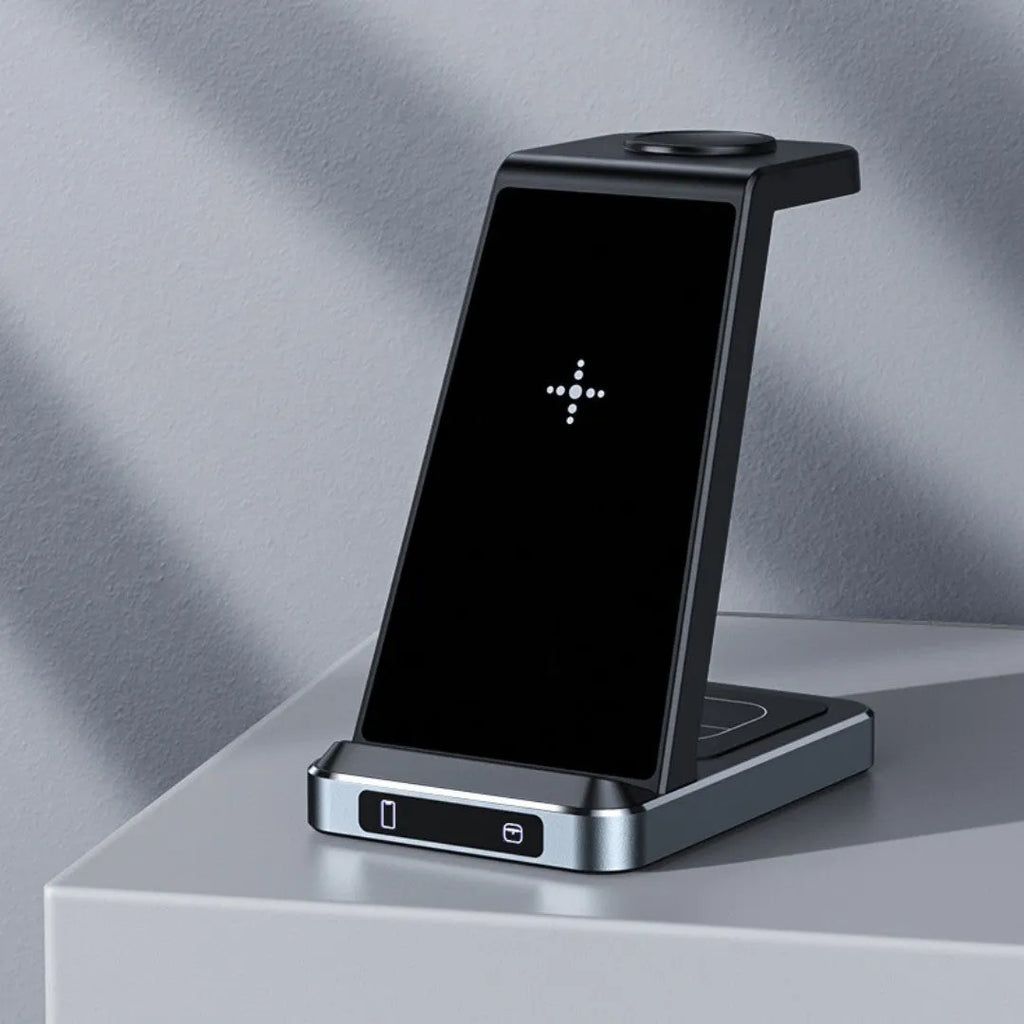 Black three-in-one wireless charger with phone watch and earbuds on charging pad