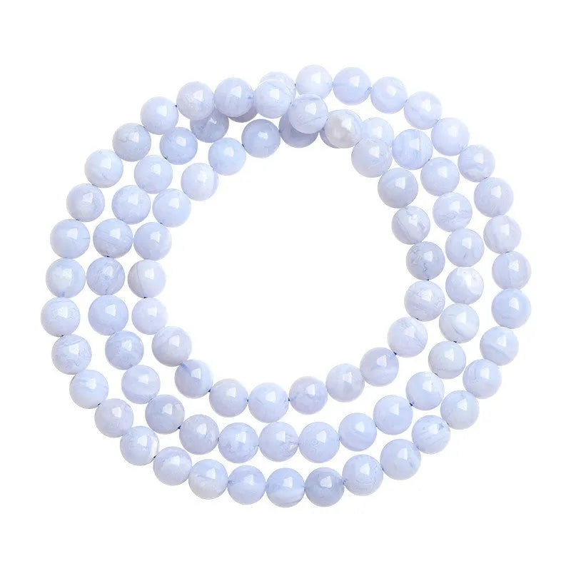 Original blue agate bracelet with multi-circle patterned beads and Ruyi design elements.