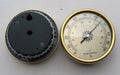 Analogue thermometer and hygrometer with aluminium dial on white background