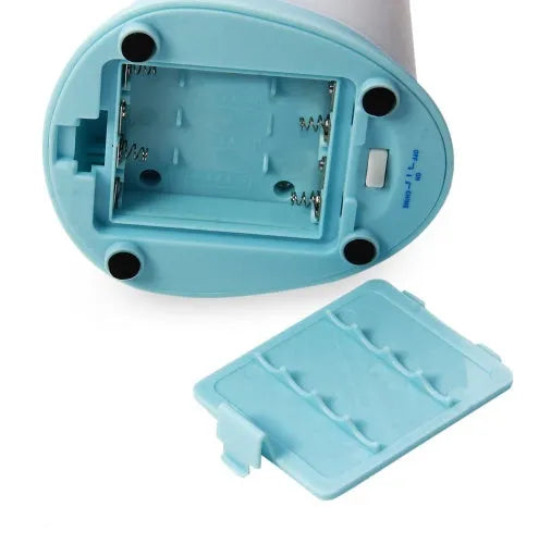 Automatic sensor soap dispenser on a desktop, white ABS plastic body with infrared sensor.
