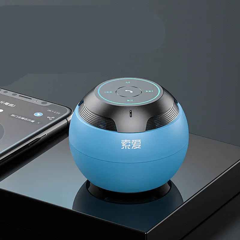 Mini portable Bluetooth speaker in black with compact 76x76x63mm plastic shell and USB port