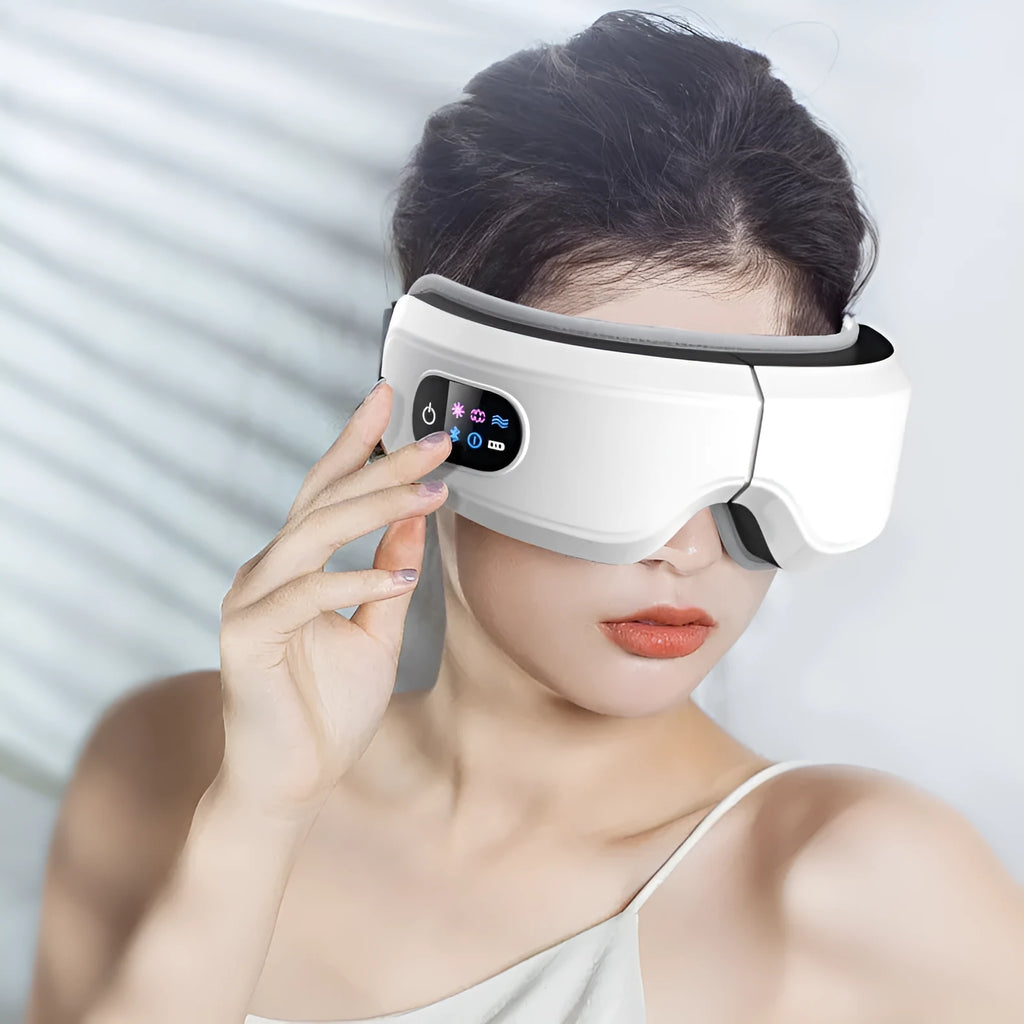 White eye massager with 16D airbag system, hot compress, and Bluetooth music for migraine relief