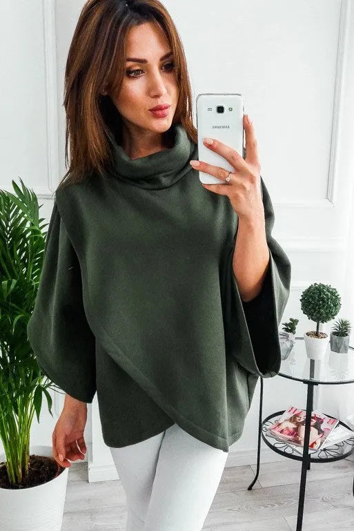Long black women's cardigan with bat sleeves and a layered fake two-piece design.