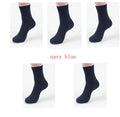 Men's bamboo fibre ankle socks in black, navy, silver grey, iron grey, and grey blue with a small square pattern.