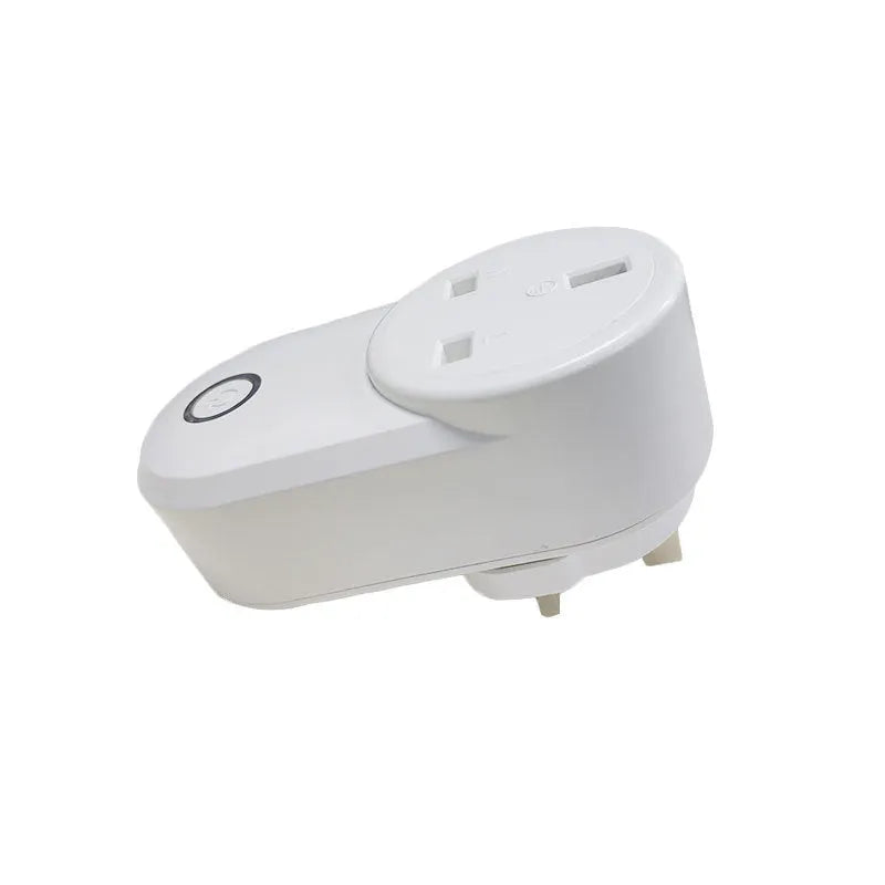 White Wi-Fi smart socket with UK 3-pin plug on a table next to a smartphone showing the ewelink app.