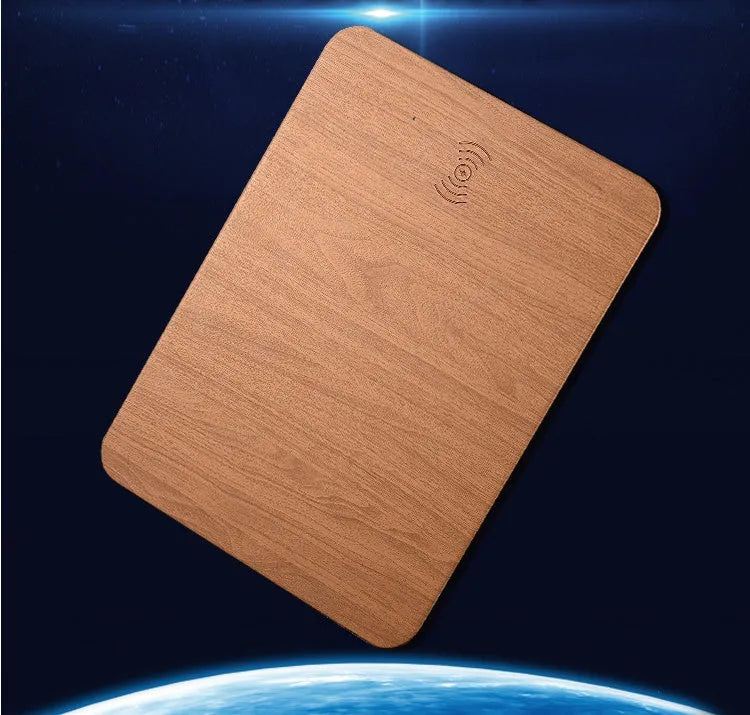 Wooden wireless charger with PU leather surface in brown finish on a desk