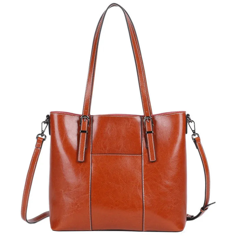 Brown genuine leather women's shoulder bag with retro styling and multiple organisational compartments