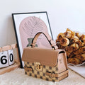 Small square retro crossbody bag with floral and rhombus pattern in a choice of colours.