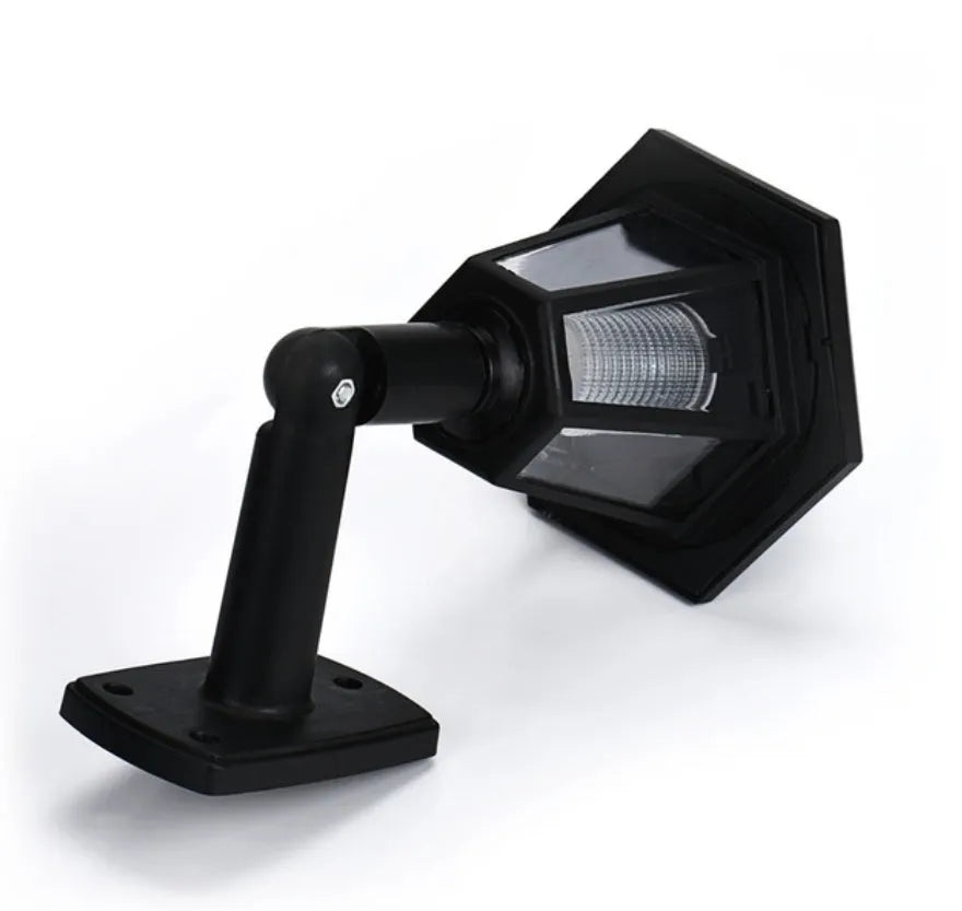 Black hexagonal solar wall lamp with automatic light sensor for outdoor installation
