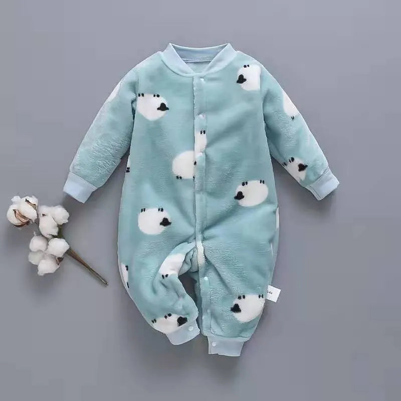 Baby wearing a long sleeve flannel romper with a printed panda pattern in pink and blue.