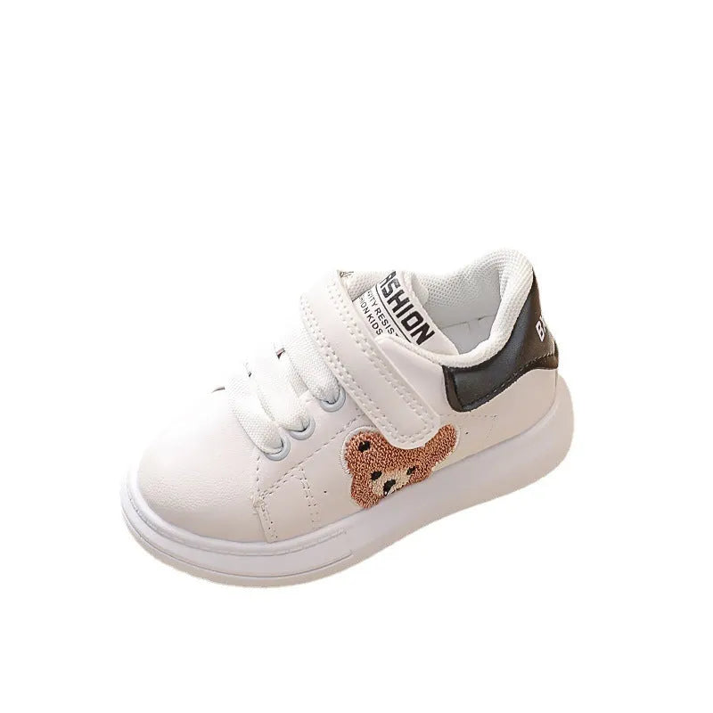 Baby Bear cartoon pattern kids sports sneakers in black, green, and khaki on a white background.