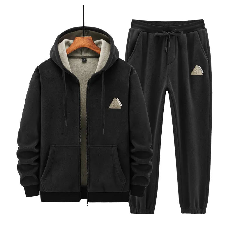 Grey cashmere-blend hooded sports jacket and matching full-length trousers laid flat.