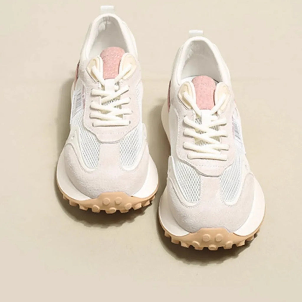 Women's grey and pink retro sneakers with low-top design and rubber soles