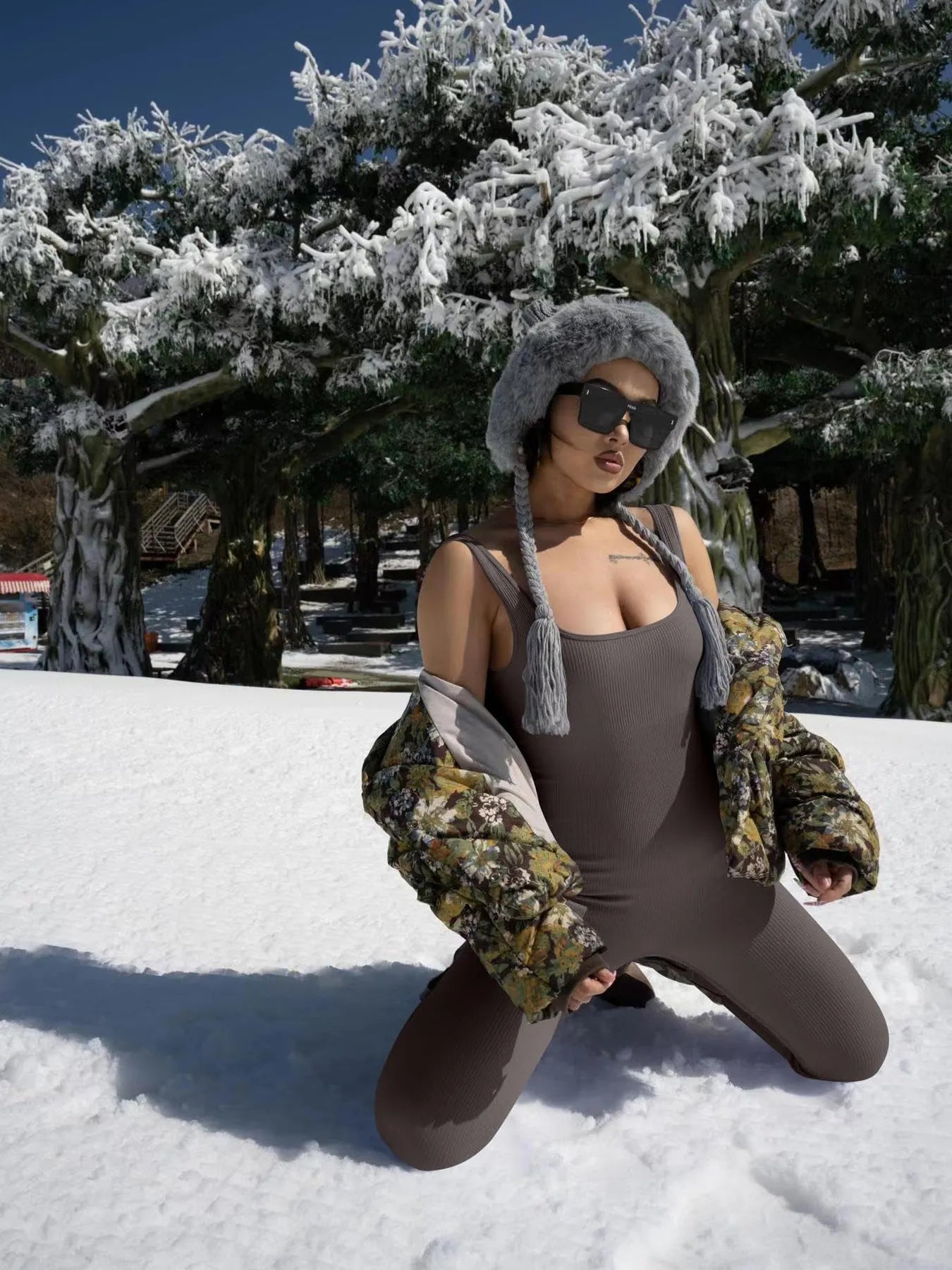 Women's long sleeve spandex suspender tank top tights with button details on a mannequin.
