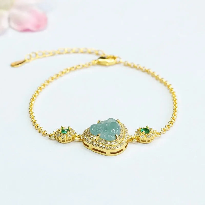 Jade bracelet with carved blue Maitreya Buddha charm and adjustable gold clasp