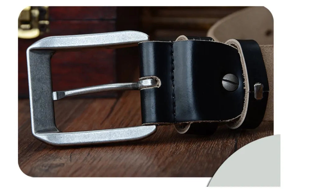 Men's leather belt in black with square alloy buckle on a dark background