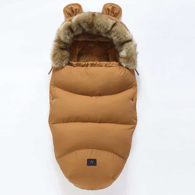 Baby warm cocoon style sleeping bag on a neutral background demonstrating solid colour design with zip closure