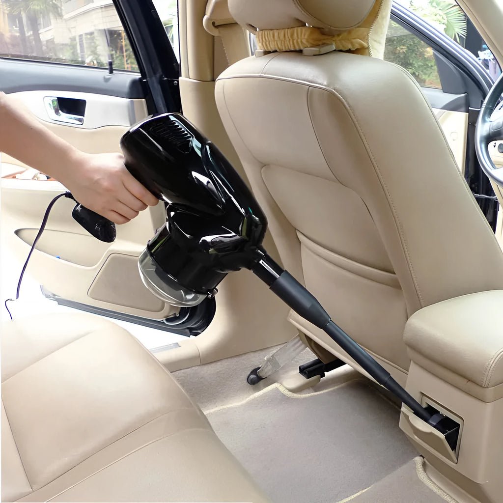 12V 100W hand-held dry wet vacuum cleaner with 6-metre cord and cigarette lighter plug sitting on car seat