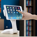 White adjustable tablet support stand with 250mm height showing clip extended to maximum 260mm width