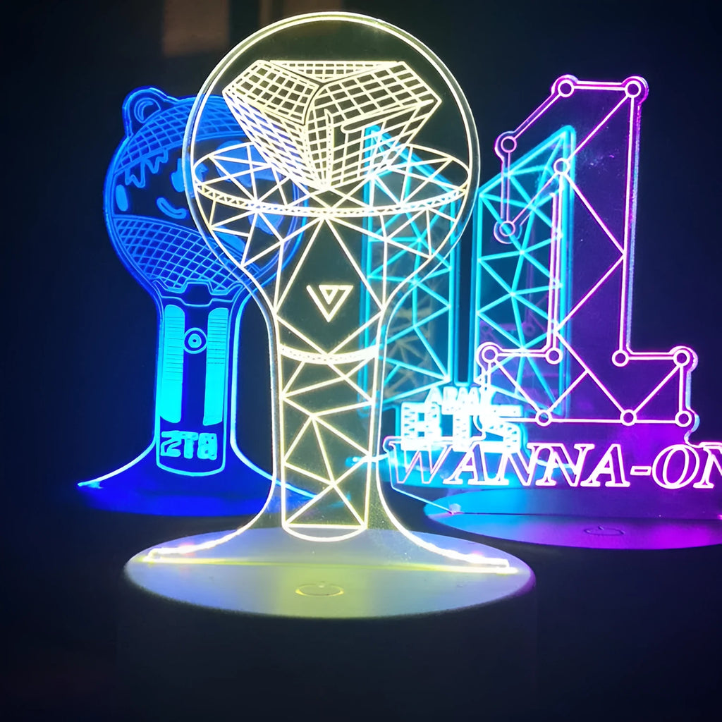 Clear acrylic stand for BTS Light 101 BTS Tower Gem album display on a table.