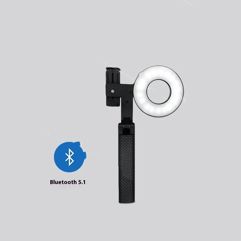 Black handheld LED fill light for mobile phone photography with adjustable brightness control