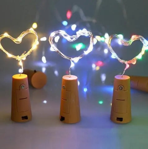 Flexible copper wire LED string lights with 20 warm white bulbs and plastic bottle stopper for wine bottle decoration
