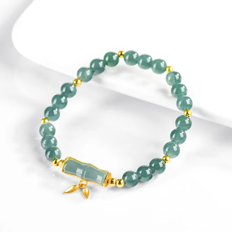 Cargo jade bracelet with blue water round beads on a S925 sterling silver chain.