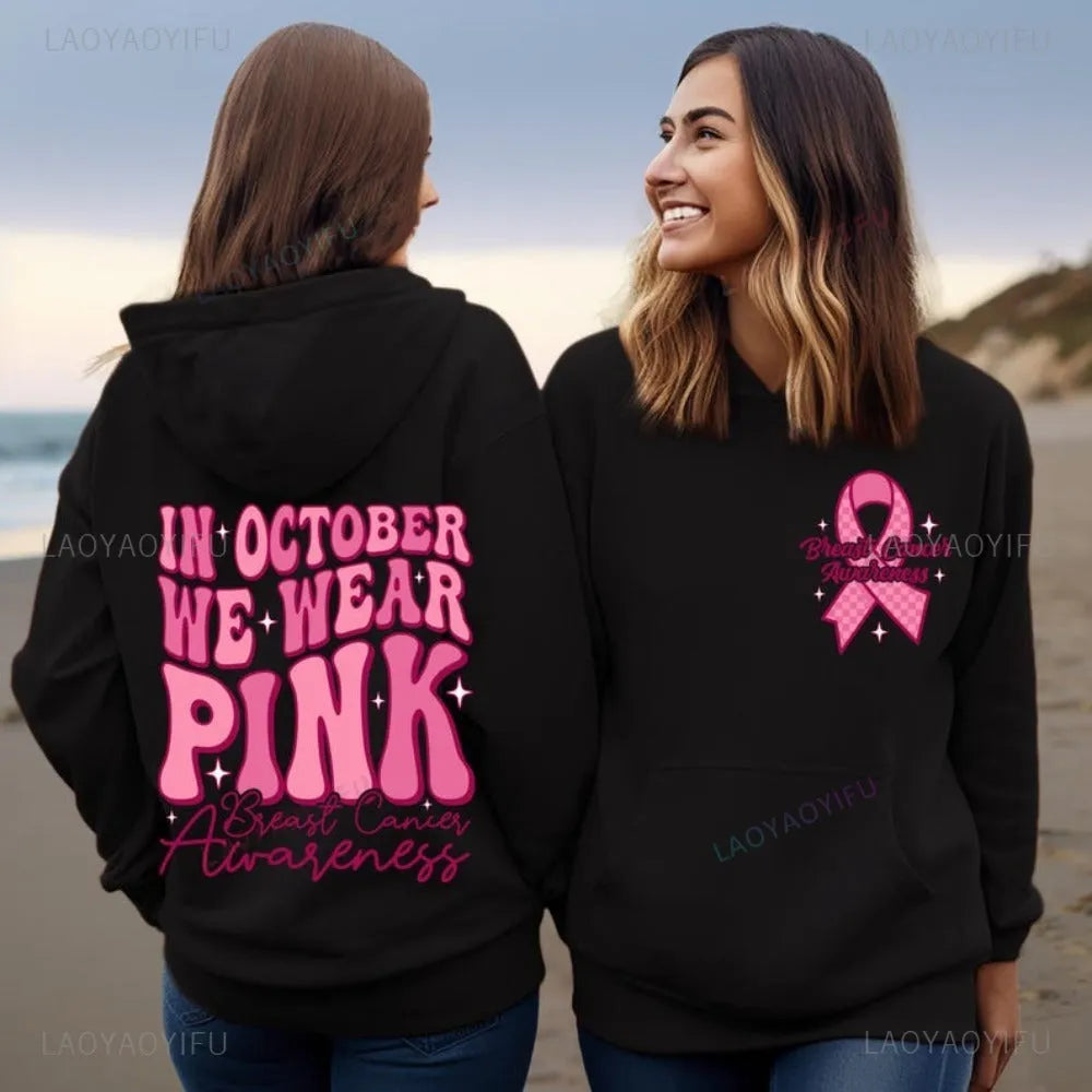 Women's pink breast cancer awareness pullover hoodie with side pockets and retro art design
