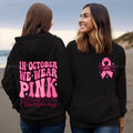 Women's pink breast cancer awareness pullover hoodie with side pockets and retro art design