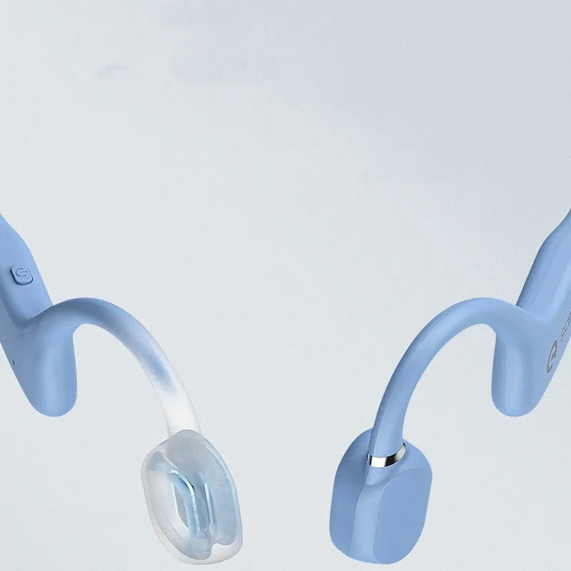Bone conduction Bluetooth headset worn around the neck in retro green colour for sports running.