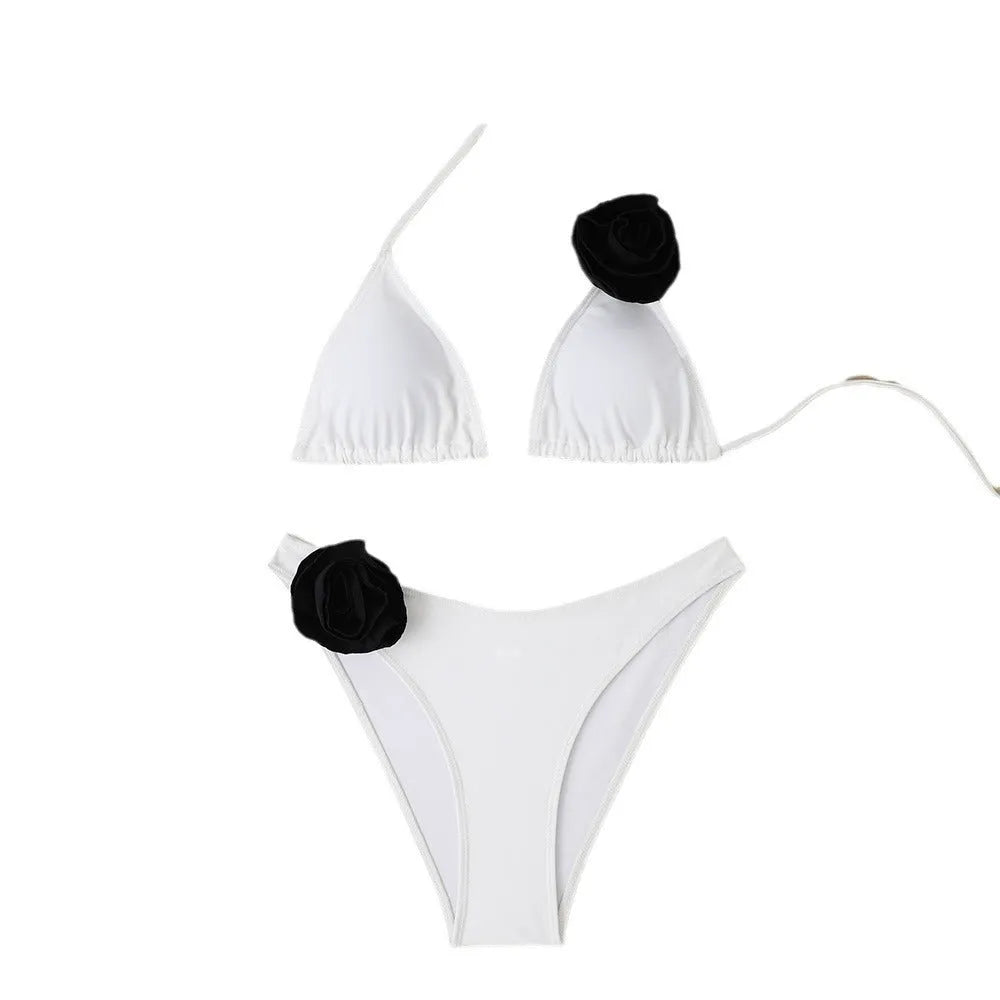 Women's floral bikini set with triangle top featuring three-dimensional flowers and lace-up split bottoms