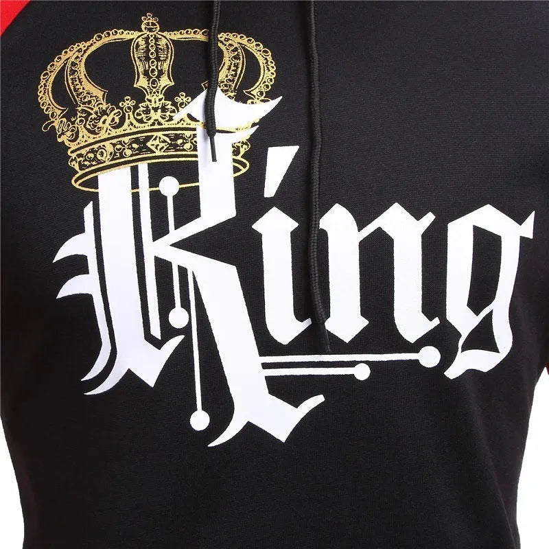 Matching printed hooded couple sweatshirts in grey with King and Queen prints on a white background