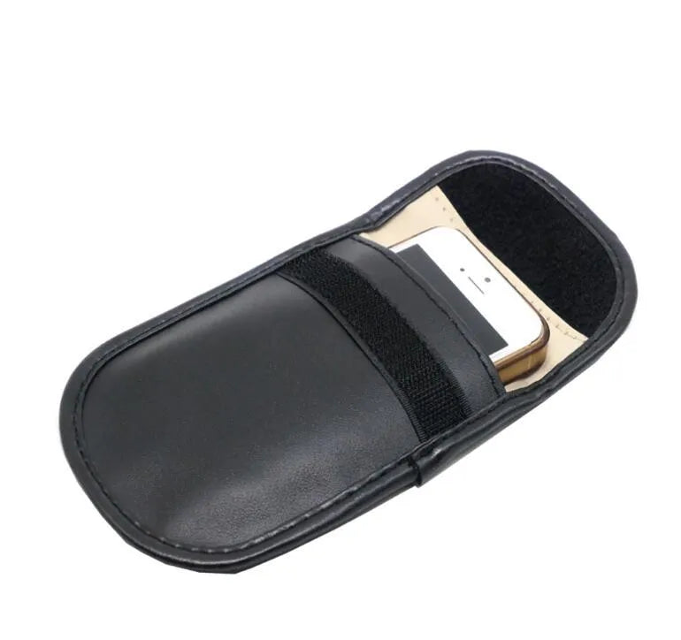 Black RFID signal blocker bag showing 13.5cm by 9.5cm dimensions on a flat surface.