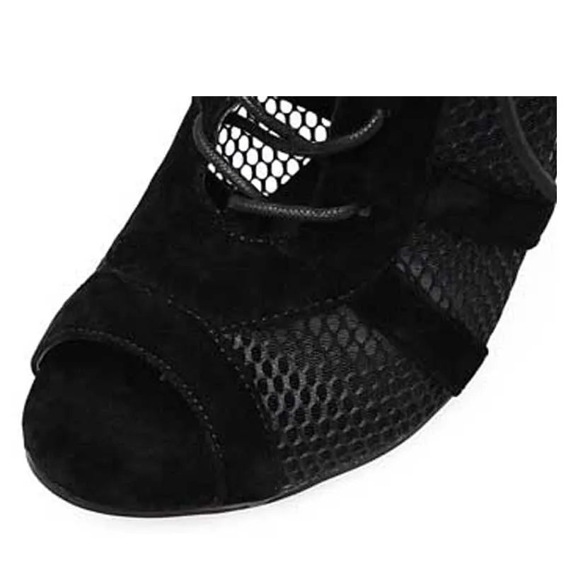 Black suede women's lace-up high heel shoes with an ankle strap, shown from the side on a white background.