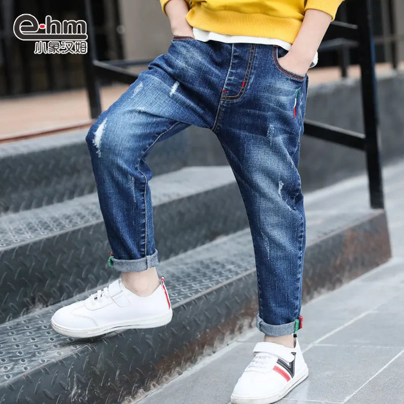 Boys' cotton denim mid-waist jeans in blue, size 140cm, front view