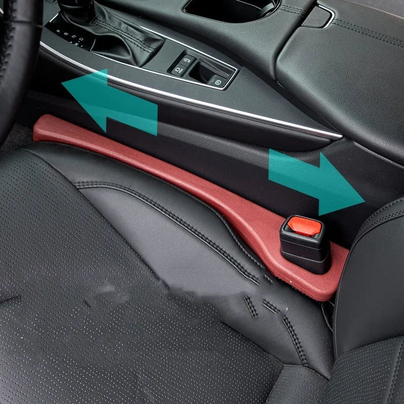 Two flexible car seat gap sealing strips with handle, shown in selected colour