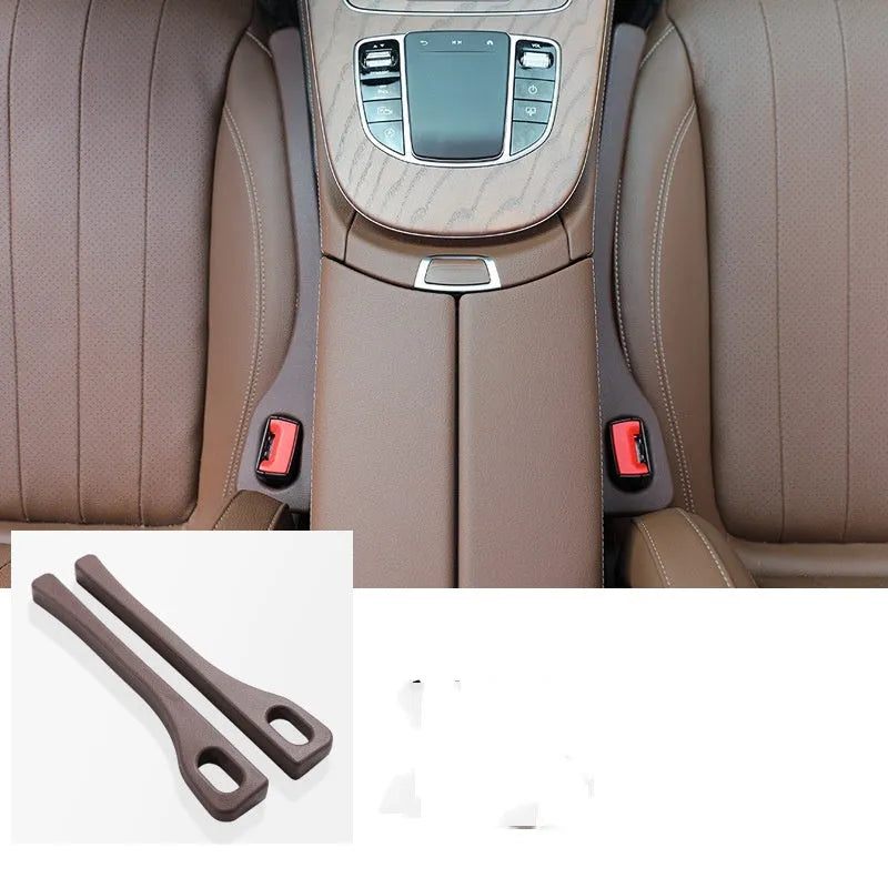 Two flexible car seat gap sealing strips with handle, shown in selected colour