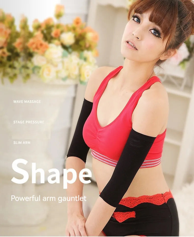 Pair of women's black shaping arm sleeves made from nylon fabric, laid flat.