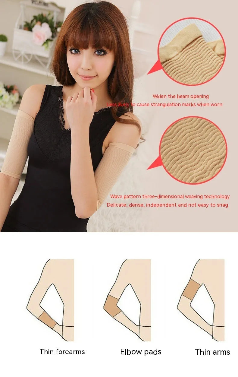 Pair of women's black shaping arm sleeves made from nylon fabric, laid flat.