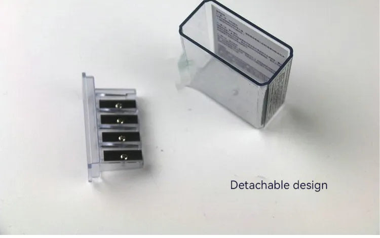 Geometric plastic pencil sharpener with four different sized sharpening holes.