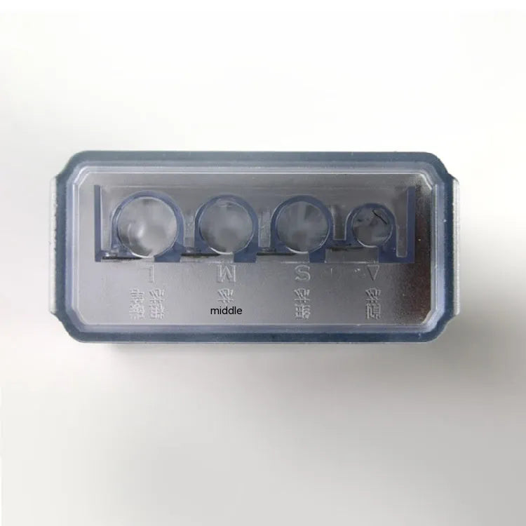 Geometric plastic pencil sharpener with four different sized sharpening holes.