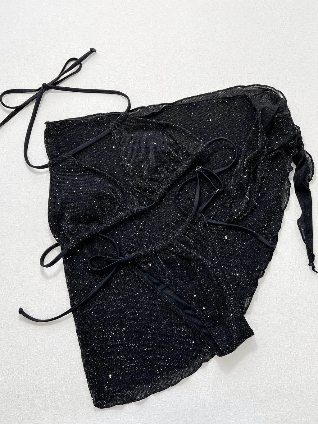 Black women's three-piece bikini set with separate top and shorts on a mannequin.