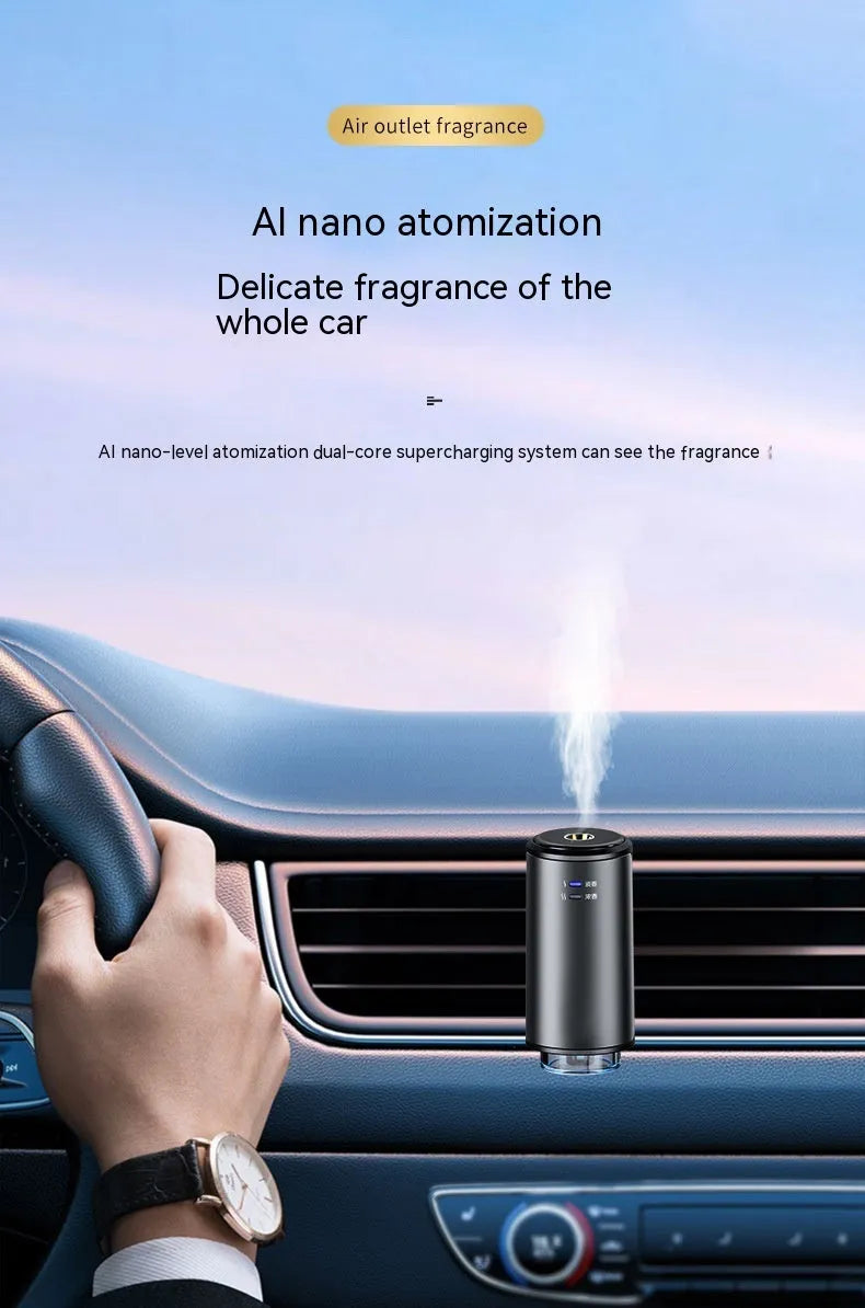 Obsidian black car aroma diffuser clipped to vehicle air vent with essential oil bottles