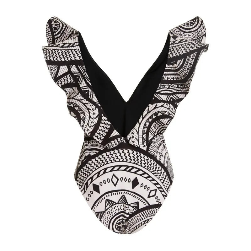 Women's vintage print one-piece swimsuit with deep V-neck and ruffled detailing in polyester fabric